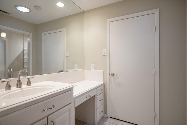 bathroom with vanity and tile patterned floors