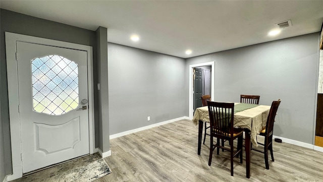 dining room featuring light hardwood / wood-style floors