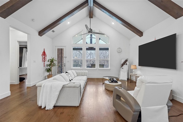 living room with ceiling fan, high vaulted ceiling, dark hardwood / wood-style floors, and beam ceiling