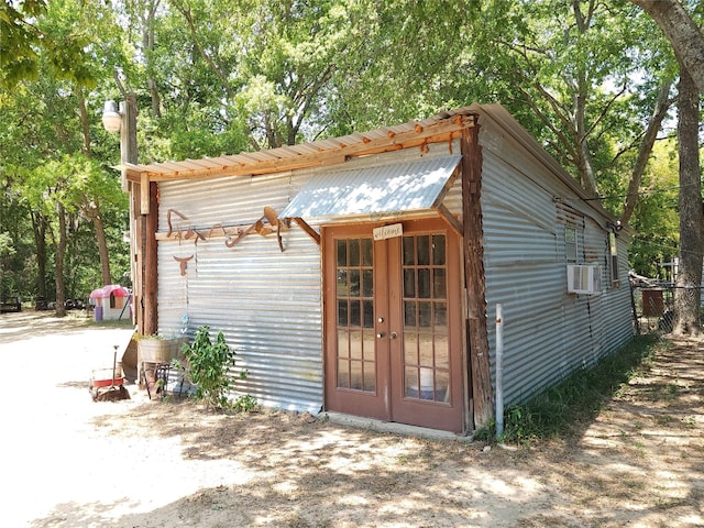 view of outdoor structure featuring cooling unit