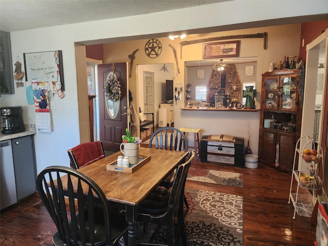 dining area with dark hardwood / wood-style flooring