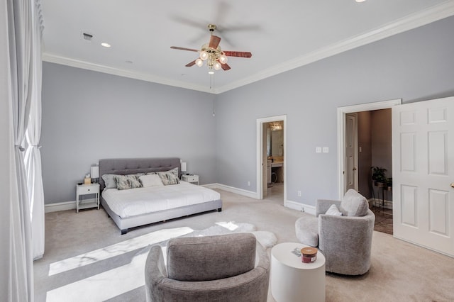 carpeted bedroom featuring crown molding, ensuite bathroom, and ceiling fan