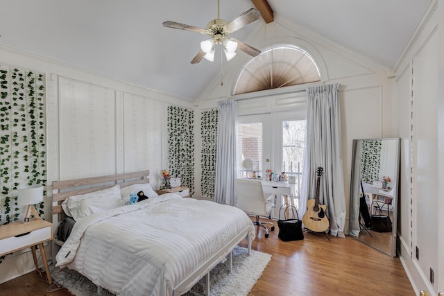 bedroom featuring vaulted ceiling, ceiling fan, hardwood / wood-style floors, and french doors