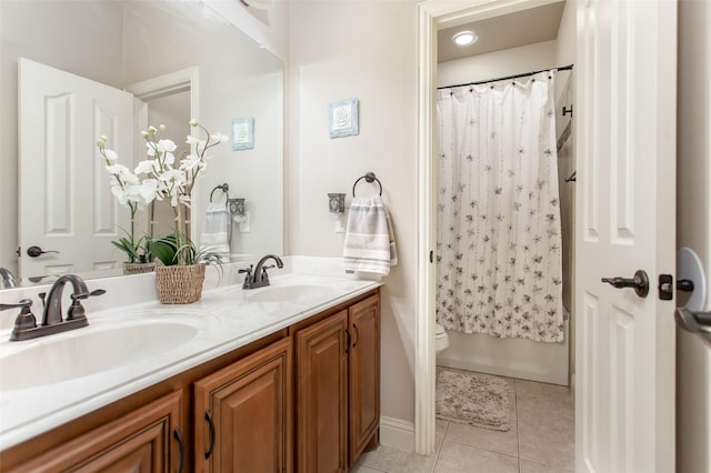 full bathroom with vanity, tile patterned floors, toilet, and shower / tub combo with curtain