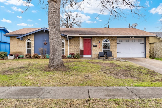 ranch-style house featuring a garage and a front yard