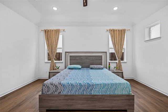 bedroom featuring dark hardwood / wood-style flooring