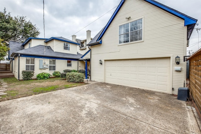 front of property featuring a garage