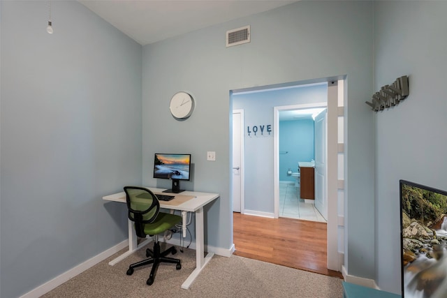 view of carpeted office space