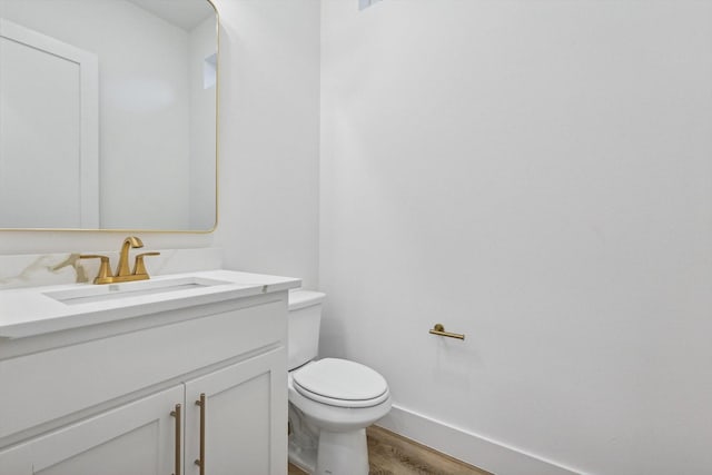 3703 Pilgrims Mews, Rowlett, TX 75088 - half bath with vanity and wood finished floors
