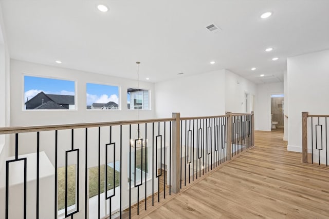3703 Pilgrims Mews, Rowlett, TX 75088 - corridor featuring recessed lighting and wood finished floors