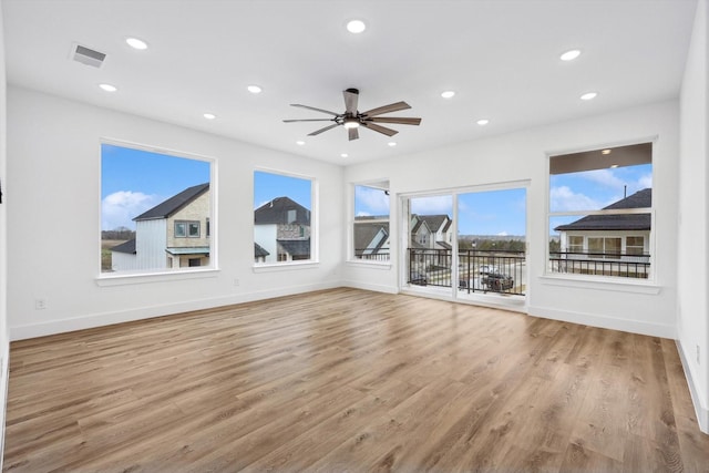 3703 Pilgrims Mews, Rowlett, TX 75088 - spare room with wood finished floors, recessed lighting, and ceiling fan