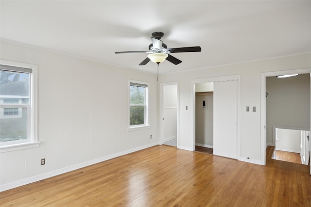 unfurnished bedroom with wood-type flooring and ceiling fan