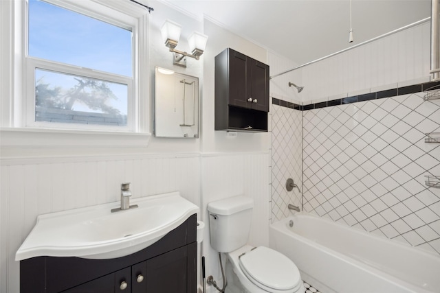 full bathroom with tiled shower / bath combo, vanity, and toilet