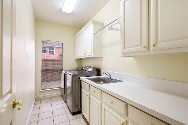 404 Twin Creeks Dr, Allen, TX 75013 - laundry area with cabinet space, washer and dryer, and light tile patterned floors