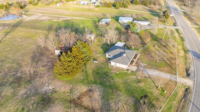 birds eye view of property featuring a rural view