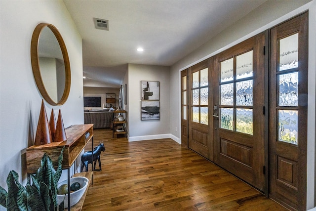 entryway with baseboards, visible vents, dark wood-style floors, french doors, and recessed lighting