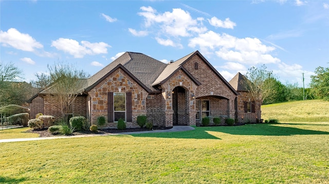 view of front of home with a front yard