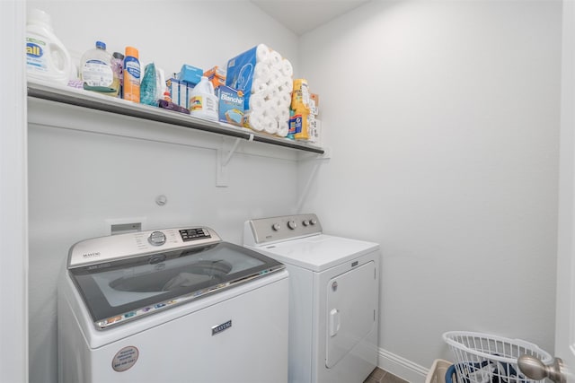 laundry area featuring independent washer and dryer