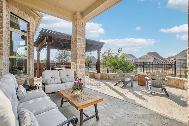 view of patio featuring an outdoor living space and a pergola