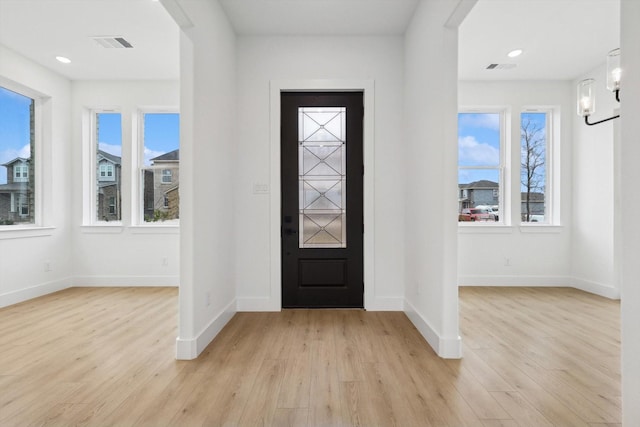 foyer entrance featuring light hardwood / wood-style flooring