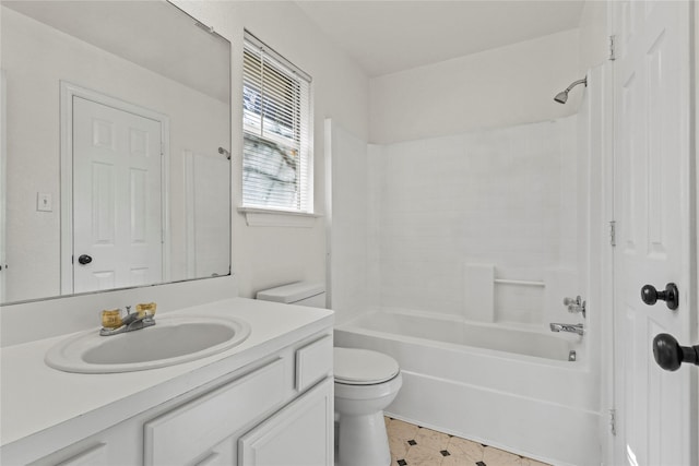 full bathroom featuring vanity, bathing tub / shower combination, and toilet