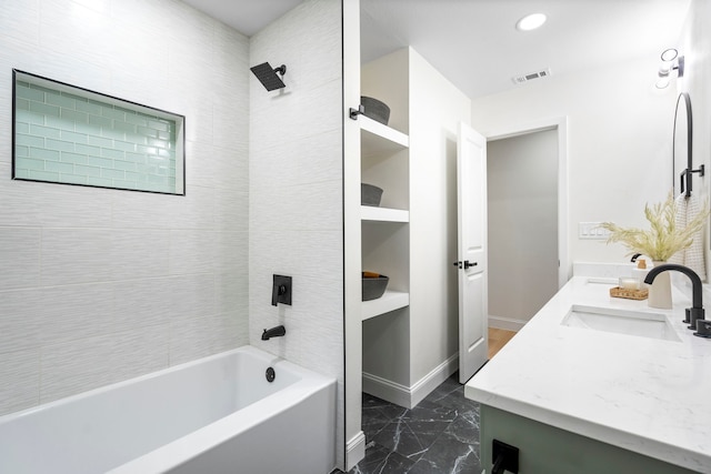 bathroom with double vanity, baseboards, visible vents, marble finish floor, and a sink