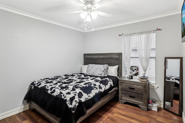 bedroom featuring crown molding, dark hardwood / wood-style floors, and ceiling fan