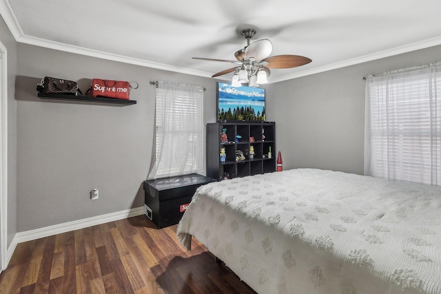 bedroom with crown molding, ceiling fan, dark hardwood / wood-style floors, and multiple windows