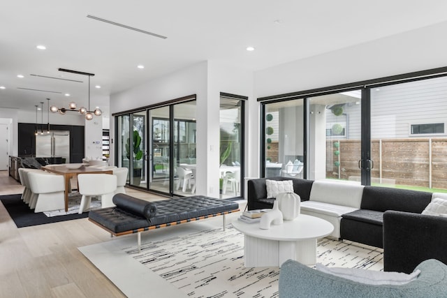 living room with light hardwood / wood-style floors