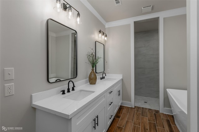 bathroom with vanity and a shower