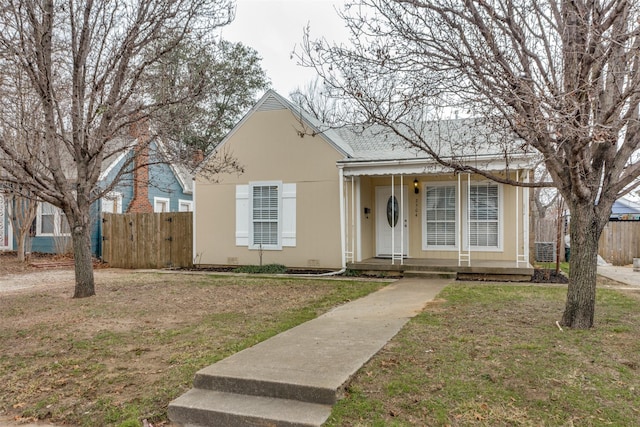 bungalow-style house with a front yard