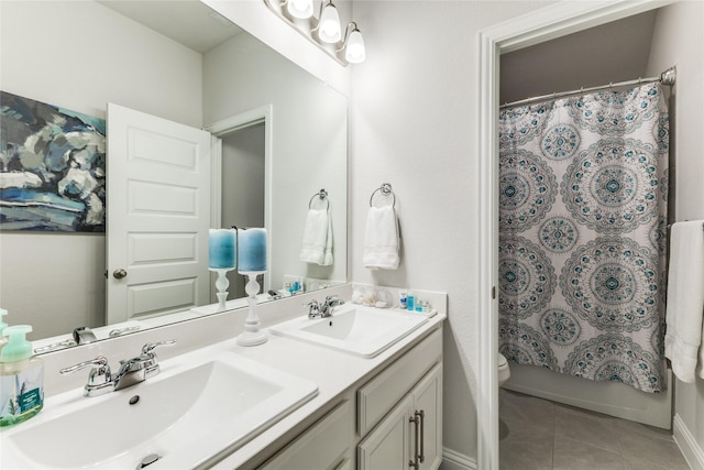 full bathroom with vanity, tile patterned floors, toilet, and shower / bath combo with shower curtain