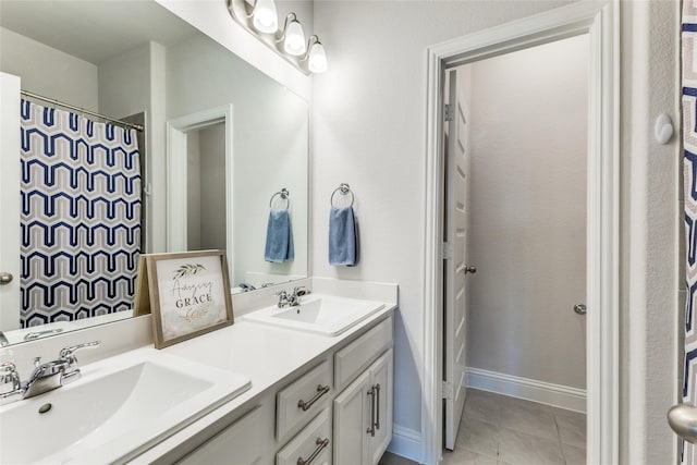 bathroom with vanity and tile patterned floors