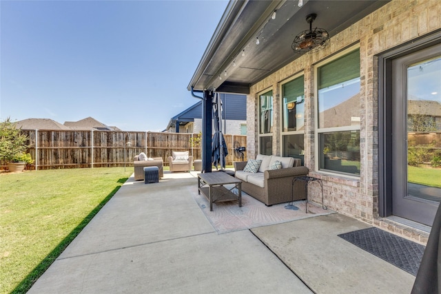 view of patio featuring an outdoor hangout area and ceiling fan