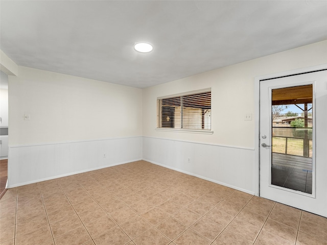 view of tiled spare room