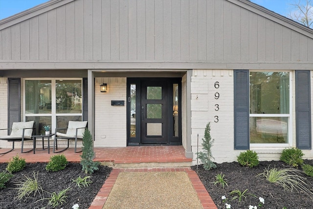 entrance to property with a porch