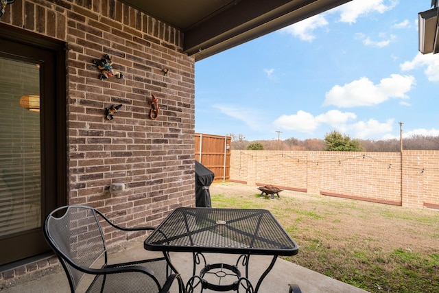 view of yard with a patio area and a fenced backyard