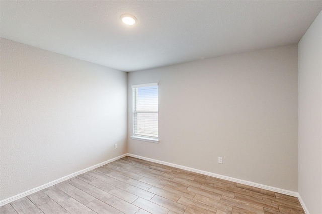 empty room featuring light hardwood / wood-style flooring