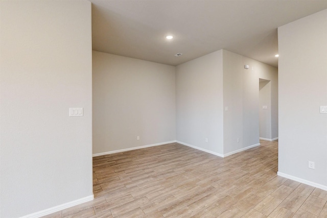 unfurnished room featuring light wood-type flooring