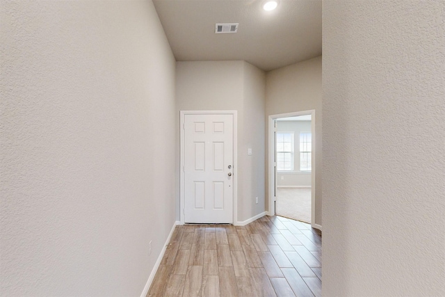 hallway featuring light hardwood / wood-style floors