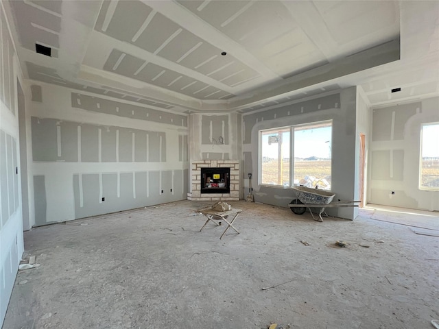 unfurnished living room with a fireplace