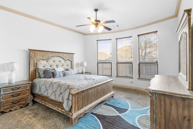 bedroom with crown molding, ceiling fan, and carpet floors