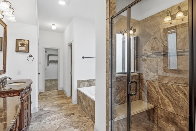 bathroom featuring independent shower and bath and vanity