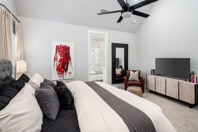 carpeted bedroom featuring ceiling fan, lofted ceiling, and connected bathroom