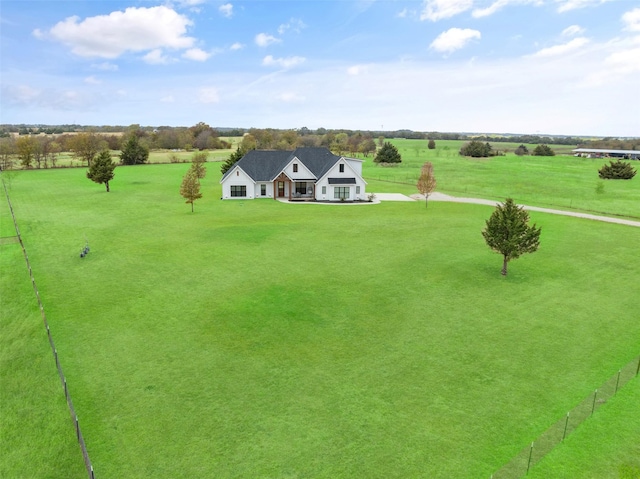 birds eye view of property featuring a rural view