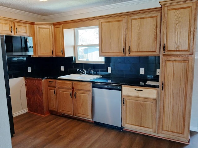 kitchen featuring dark wood-type flooring, sink, ornamental molding, stainless steel appliances, and decorative backsplash