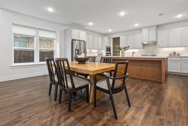 dining room featuring dark hardwood / wood-style floors