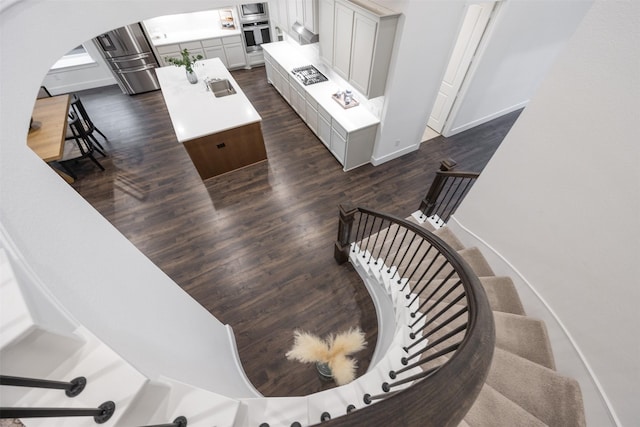 stairway with wood-type flooring