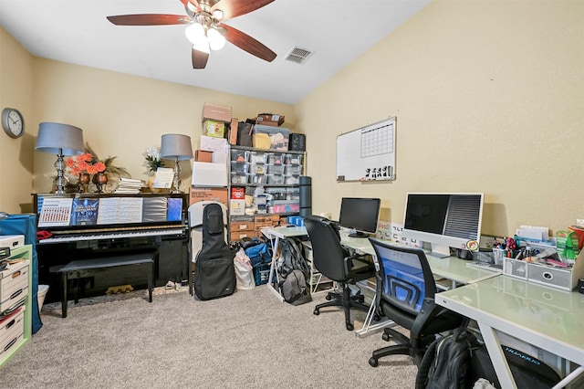 carpeted office space with ceiling fan