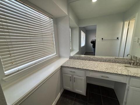 bathroom with vanity and tile patterned floors